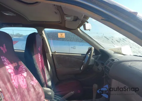 1999 Toyota Corolla Le z USA, uszkodzony, nr VIN 2T1BR12E6XC161465